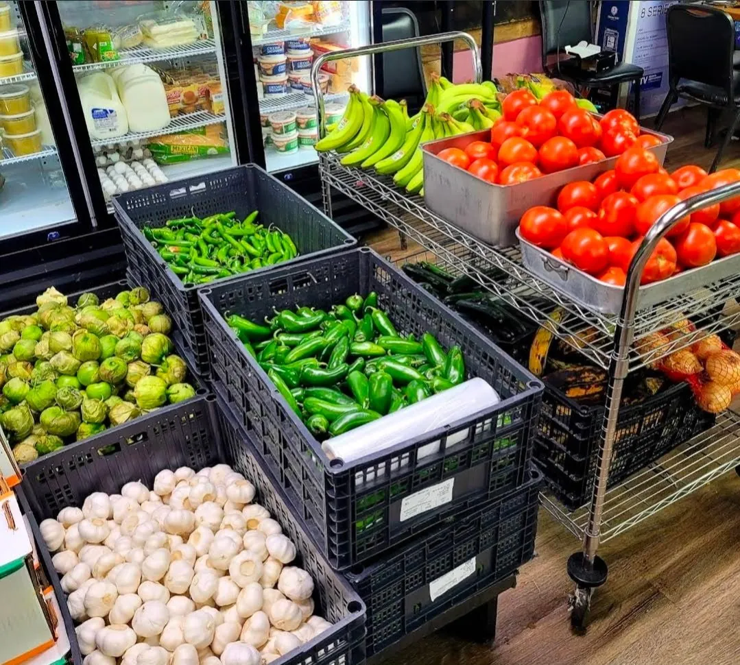Fresh local produce stacked outside Joe's Meat Market